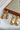 103657001 IMPORTADO BRINCO OVAL DOU