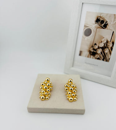 06357 - IMPORTED EARRINGS AND RINGS