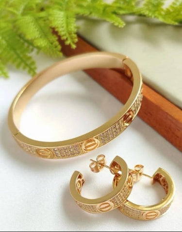 104394001001 IMPORTADO BRINCO CRAVEJADO LOVE DOU
